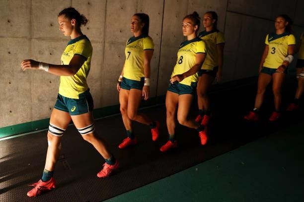 The Team Australia players prepare to take the field in the Women’s pool C match between Team Australia and Team China during the Rugby Sevens on day...