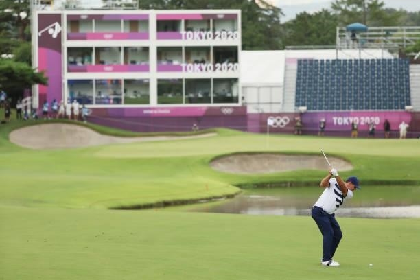 Patrick Reed of Team United States plays a shot on the 18th hole during the first round of the Men's Individual Stroke Play on day six of the Tokyo...
