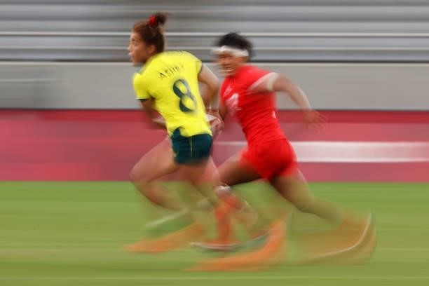 Madison Ashby of Team Australia looks to pass in the Women’s pool C match between Team Australia and Team China during the Rugby Sevens on day six of...