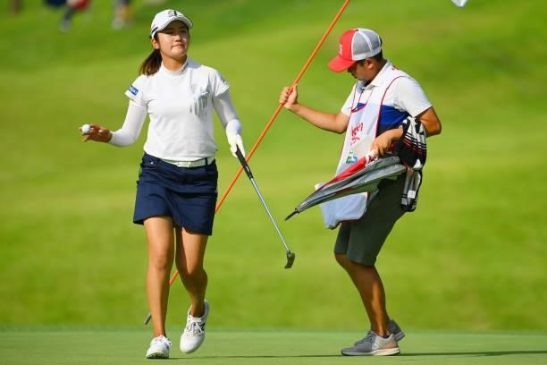 Mone Inami of Japan celebrates the birdie on the 10th green during the first round of Rakuten Super Ladies at Tokyu Grand Oak Golf Club on July 29,...
