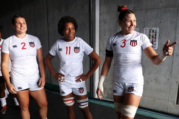Ilona Maher, Kris Thomas and Abby Gustaitis of Team United States share a laugh as they prepare to take the field for the Women’s pool C match...