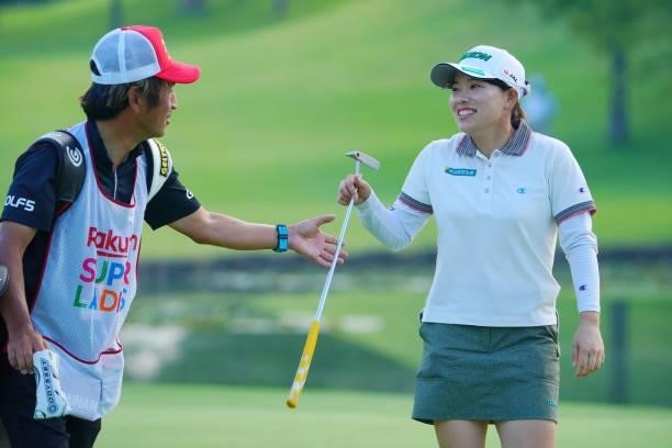 Minami Katsu of Japan smiles after holing out on the 18th green during the first round of Rakuten Super Ladies at Tokyu Grand Oak Golf Club on July...