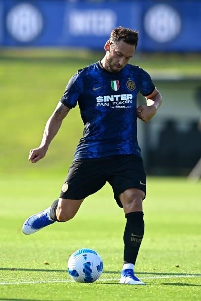 Hakan Calhanoglu of FC Internazionale in action during the pre-season friendly match between FC Internazionale and FC Crotone at the club's training...