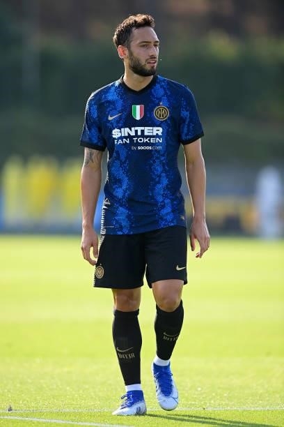 Hakan Calhanoglu of FC Internazionale looks on during the pre-season friendly match between FC Internazionale and FC Crotone at the club's training...