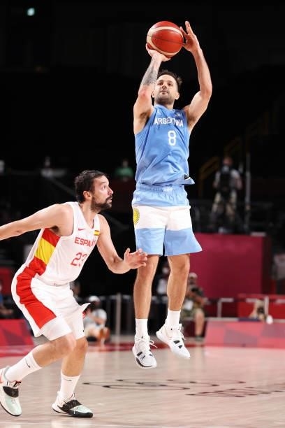 Nicolas Laprovittola of Team Argentina shoots over Sergio Llull of Team Spain during the second half of a Men's Preliminary Round Group C game on day...