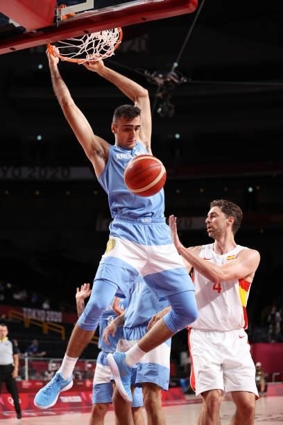 Juan Pablo Vaulet of Team Argentina dunks against Spain during the second half of a Men's Preliminary Round Group C game on day six of the Tokyo 2020...
