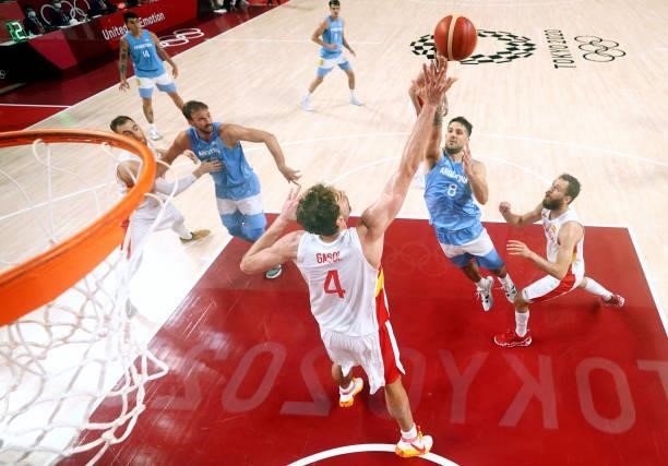 Nicolas Laprovittola of Team Argentina shoots over Pau Gasol of Team Spain during the first half of a Men's Preliminary Round Group C game on day six...