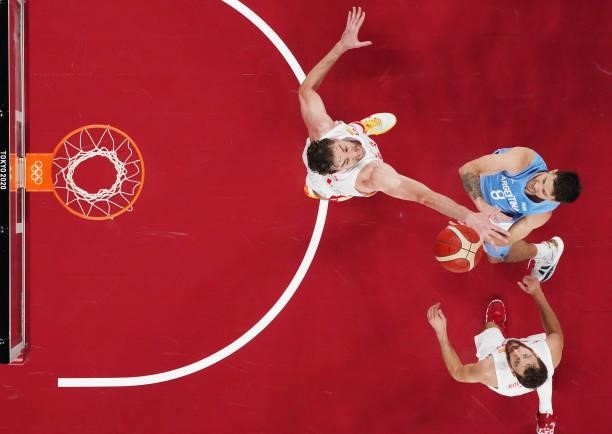 Nicolas Laprovittola of Team Argentina shoots over Pau Gasol of Team Spain during the first half of a Men's Preliminary Round Group C game on day six...