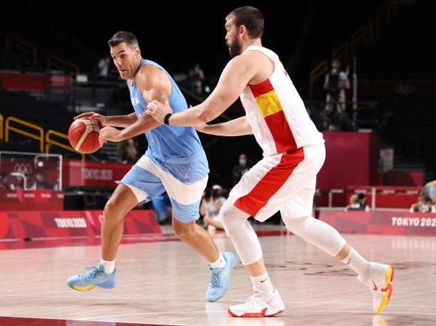 Luis Scola of Team Argentina drives to the basket against Marc Gasol of Team Spain during the second half of a Men's Preliminary Round Group C game...