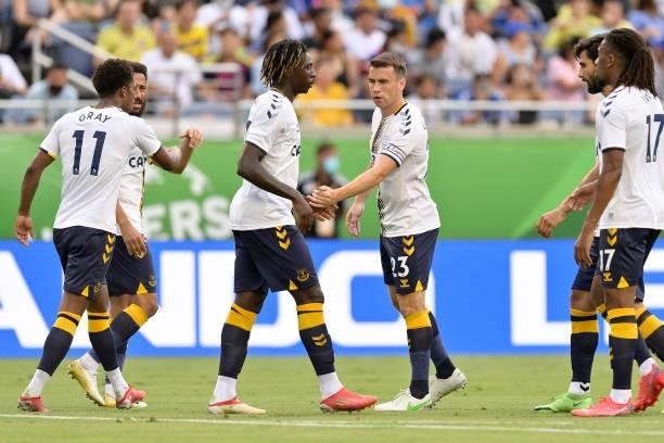 Moise Kean celebrates his goal with Seamus Coleman of Everton during the Everton FC v UNAM Pumas pre-season friendly match on July 28, 2021 in...