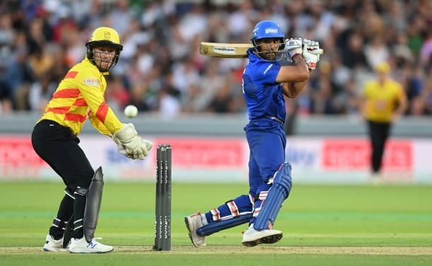 Ravi Bopara of London Spirit hits out watched by Tom Moores of Trent Rockets during The Hundred match between London Spirit and Trent Rockets at...
