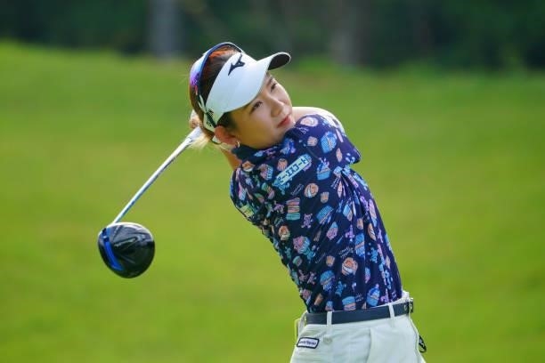 Hikaru Yoshimoto of Japan hits her tee shot on the 11th hole during the second round of Rakuten Super Ladies at Tokyu Grand Oak Golf Club on July 30,...