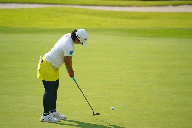 Ai Suzuki of Japan holes the birdie putt on the 12th green during the second round of Rakuten Super Ladies at Tokyu Grand Oak Golf Club on July 30,...