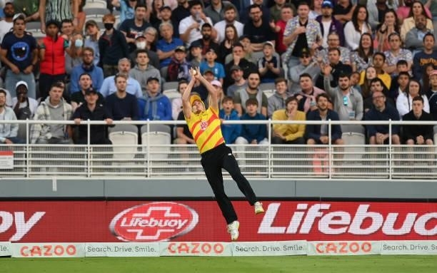 Luke Wood of Trent Rockets catches Eoin Morgan of London Spirit during The Hundred match between London Spirit and Trent Rockets at Lord's Cricket...