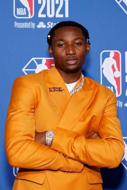 Jonathan Kuminga poses for photos on the red carpet during the 2021 NBA Draft at the Barclays Center on July 29, 2021 in New York City.