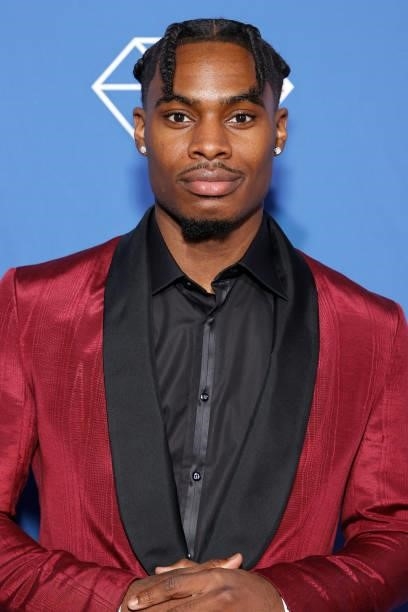 Davion Mitchell poses for photos on the red carpet during the 2021 NBA Draft at the Barclays Center on July 29, 2021 in New York City.