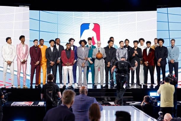 Commissioner Adam Silver poses for photos with members of the 2021 draft class during the 2021 NBA Draft at the Barclays Center on July 29, 2021 in...
