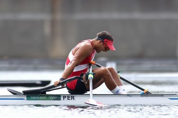 Alvaro Torres Masias of Team Peru reacts after coming in fifth during the Men's Single Sculls Final C on day seven of the Tokyo 2020 Olympic Games at...