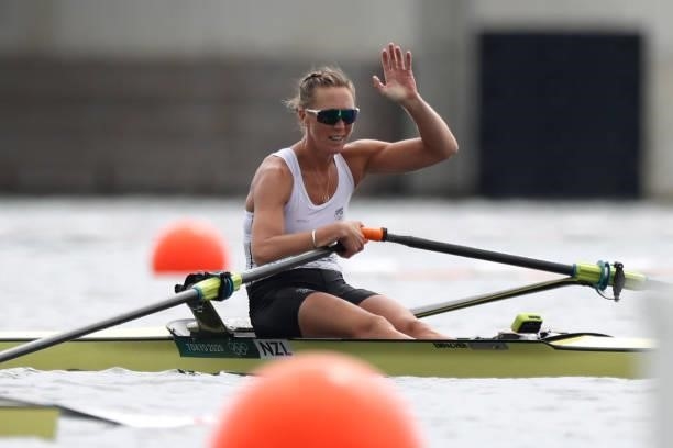 Emma Twigg of Team New Zealand waves after winning the gold medal during the Women's Single Sculls Final A on day seven of the Tokyo 2020 Olympic...