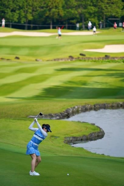 Yuna Nishimura of Japan hits her second shot on the 13th hole during the second round of Rakuten Super Ladies at Tokyu Grand Oak Golf Club on July...