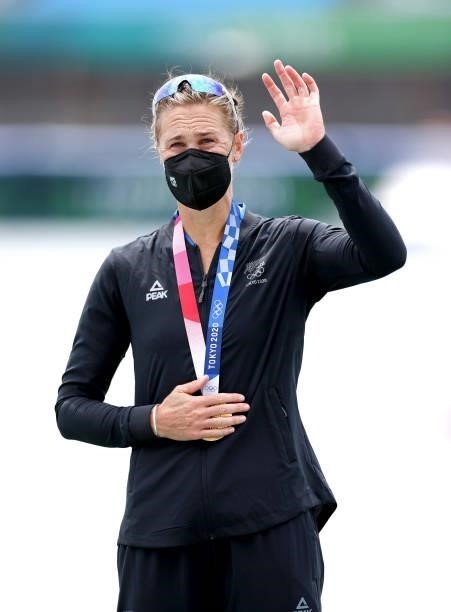 Gold medalist Emma Twigg of Team New Zealand poses with her medal during the medal ceremony for the Women's Single Sculls Final A on day seven of the...