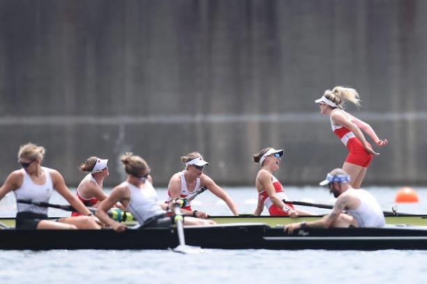 Madison Mailey, Sydney Payne, Avalon Wasteneys and Kristen Kit of Team Canada react after winning the gold medal during the Women's Eight Final A on...