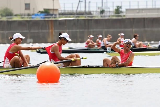 Jingjing Li, Linlin Guo and Dechang Zhang of Team China celebrate winning the bronze medal during the Women's Eight Final A on day seven of the Tokyo...