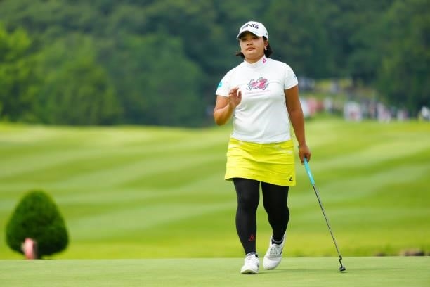 Ai Suzuki of Japan acknowledges fans after the birdie on the 18th green during the second round of Rakuten Super Ladies at Tokyu Grand Oak Golf Club...