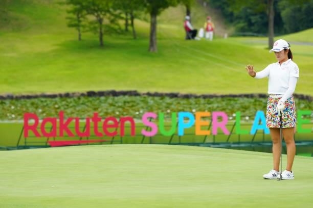 Mone Inami of Japan lines up a putt on the 18th green during the second round of Rakuten Super Ladies at Tokyu Grand Oak Golf Club on July 30, 2021...