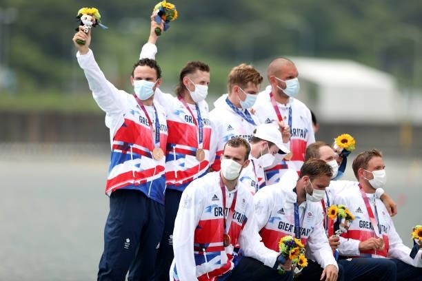 Team Great Britain pose with their bronze medals during the medal ceremony for the Men's Eight Final A on day seven of the Tokyo 2020 Olympic Games...