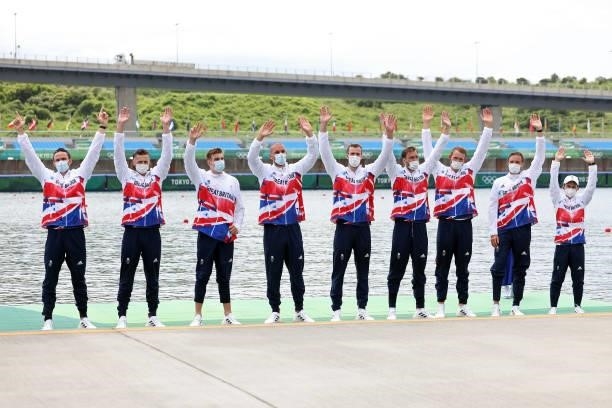 Team Great Britain celebrate winning the bronze medal during the medal ceremony for the Men's Eight Final A on day seven of the Tokyo 2020 Olympic...