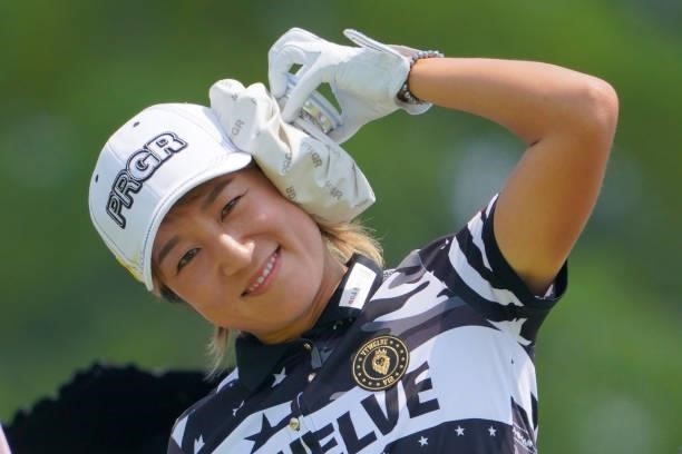 Asako Fujimoto of Japan puts an ice bag on her head to cool herself down on the 1st tee during the second round of Rakuten Super Ladies at Tokyu...