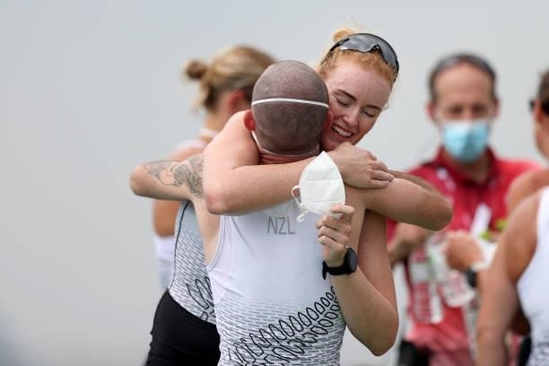 Grace Prendergast of Team New Zealand celebrates with Coxswain Caleb Shepherd after winning the silver medal during the Women's Eight Final A on day...