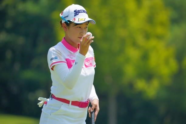 Nana Suganuma of Japan acknowledges fans on the 1st green during the second round of Rakuten Super Ladies at Tokyu Grand Oak Golf Club on July 30,...
