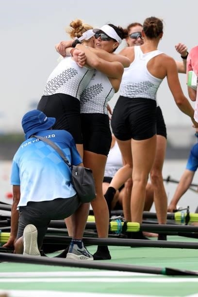 Grace Prendergast, Kelsey Bevan, Lucy Spoors and Emma Dyke of Team New Zealand celebrate winning the silver medal after the Women's Eight Final A on...