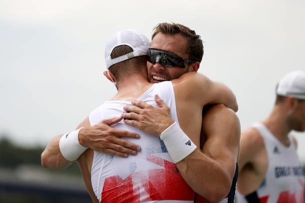 Team Great Britain celebrate winning the bronze medal during the Men's Eight Final A on day seven of the Tokyo 2020 Olympic Games at Sea Forest...