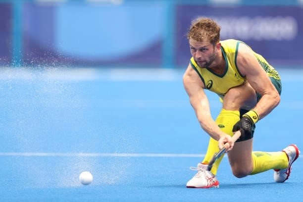 Joshua Beltz of Team Australia passes the ball during the Men's Preliminary Pool A match between Australia and Spain on day seven of the Tokyo 2020...
