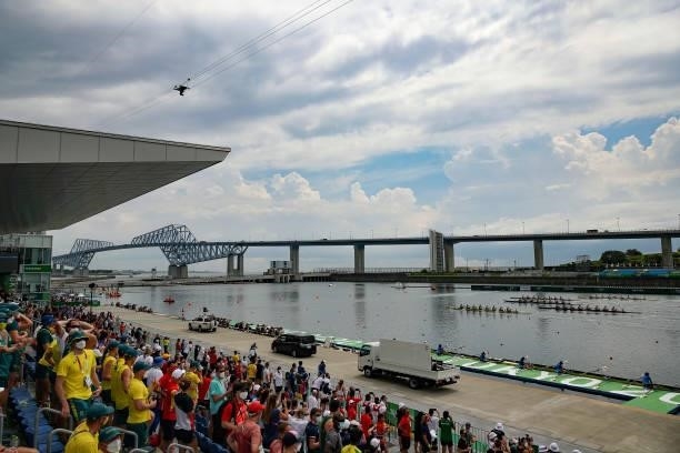 People watch as athletes compete during the Men's Eight Final A on day seven of the Tokyo 2020 Olympic Games at Sea Forest Waterway on July 30, 2021...