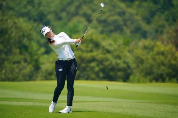 Asuka Kashiwabara of Japan hits her second shot on the 2nd hole during the second round of Rakuten Super Ladies at Tokyu Grand Oak Golf Club on July...