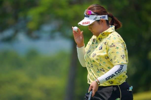 Miki Sakai of Japan acknowledges fans on the 2nd green during the second round of Rakuten Super Ladies at Tokyu Grand Oak Golf Club on July 30, 2021...