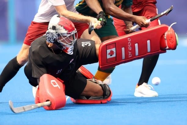 Antoni Pawel Kindler of Team Canada defends the goal during the Men's Preliminary Pool A match between Canada and South Africa on day seven of the...