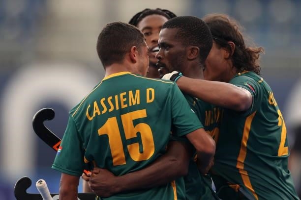 Samkelo Mvimbi of Team South Africa celebrates scoring the fourth goal with Abdud Dayaan Cassiem and Mustaphaa Cassiem during the Men's Preliminary...