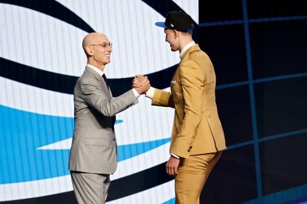 Commissioner Adam Silver and Franz Wagner shake hands after Wagner was drafted by the Orlando Magic during the 2021 NBA Draft at the Barclays Center...