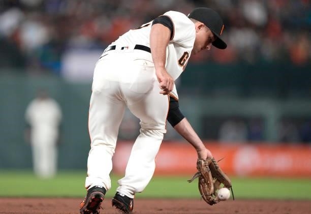 Jason Vosler of the San Francisco Giants reacts to field a ground ball off the bat of Justin Turner of the Los Angeles Dodgers in the top of the six...
