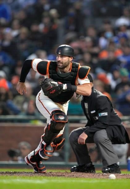Curt Casali of the San Francisco Giants chases after a ball pitched in the dirt against the Los Angeles Dodgers in the top of the fifth inning at...