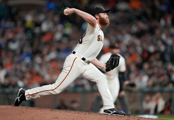 John Brebbia of the San Francisco Giants pitches against the Los Angeles Dodgers in the top of the seventh inning at Oracle Park on July 28, 2021 in...