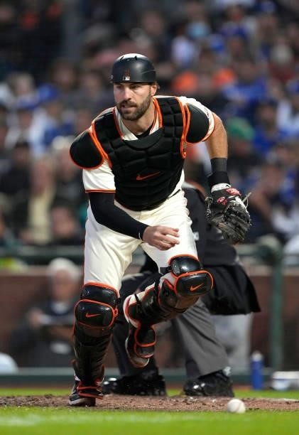 Curt Casali of the San Francisco Giants chases after a ball pitched in the dirt against the Los Angeles Dodgers in the top of the fifth inning at...