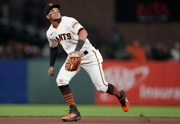 Thairo Estrada of the San Francisco Giants reacts to the ball off the bat against the Los Angeles Dodgers in the top of the seventh inning at Oracle...
