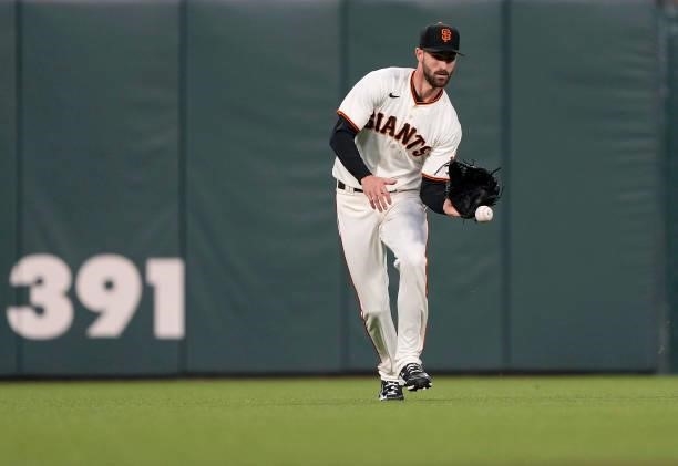 Steven Duggar of the San Francisco Giants fields a ball in center field off the bat of AJ Pollock of the Los Angeles Dodgers in the top of the fifth...