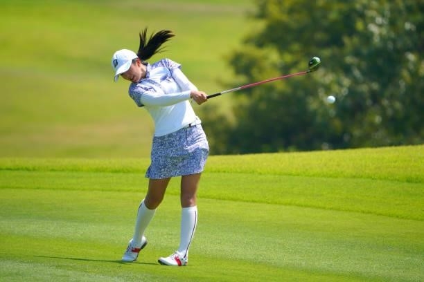 Kotone Hori of Japan hits her second shot on the 4th hole during the second round of Rakuten Super Ladies at Tokyu Grand Oak Golf Club on July 30,...